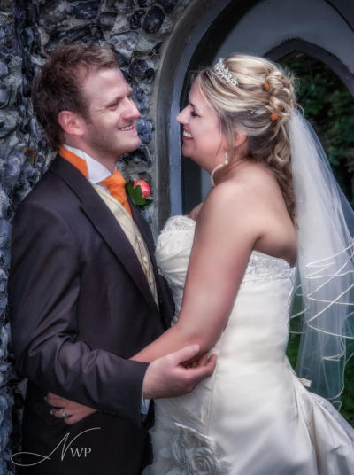 Bride and groom at Donnington Grove Hotel by Newbury Wedding Photography