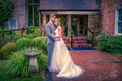 Bride and groom after rain in Theatre gardens by Newbury Wedding Photography