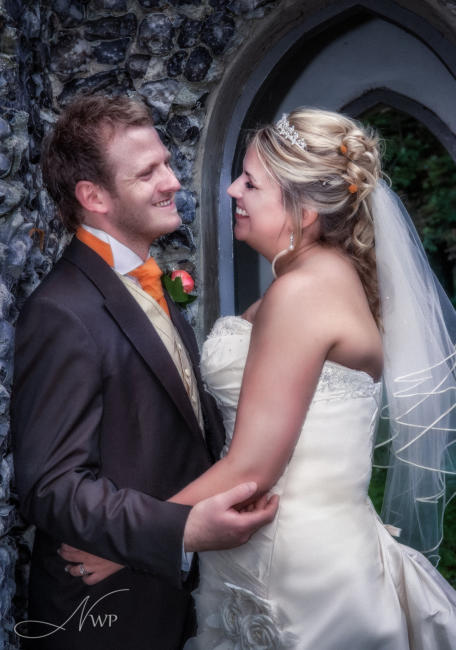 Bride and groom at Donnington Grove Hotel by Newbury Wedding Photography